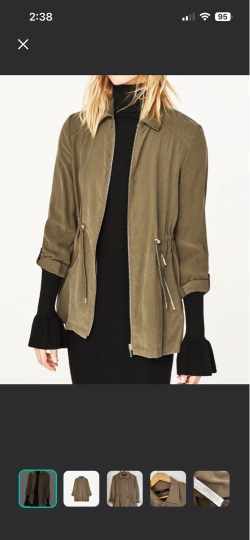 Zara Olive Green Jacket (Category: Coats, Jackets and Outerwear) located in Makati City. Submitted by skippydeclutters (Listing ID 1421510497, Image 1). Description: - Zara jacket - olive green color but with discoloration - Zip-up front - Drawstring waist - Long sleeves (can be rolled up) - Two front pockets - Collar - Lightweight, ideal for layering.