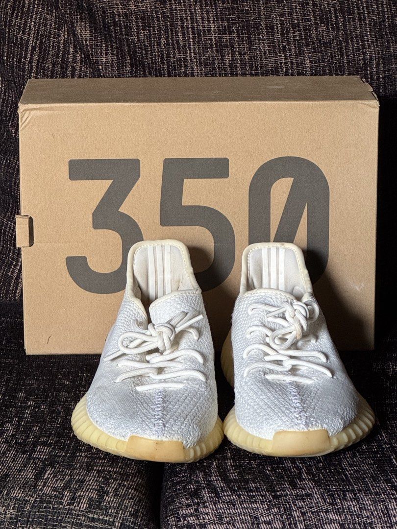Adidas Yeezy Boost 350 V2 - White (Category: Sneakers) located in Muntinlupa City. Submitted by cher_ami (Listing ID 1421629455, Image 1). Description: - Adidas Yeezy Boost 350 V2 - Color: White - Size: US 8 - Includes original box - Features: - White upper - White laces - Light yellow sole - Adidas logo on insole - Yeezy Boost 350 V2 label on box.