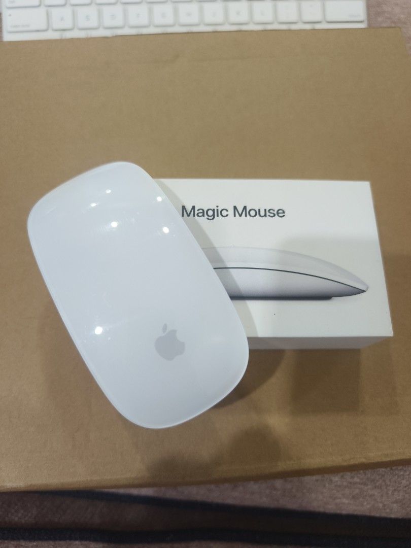 Apple Magic Mouse 2 (Category: Mouse & Mousepads) located in Kuala Lumpur. Submitted by alanchong77 (Listing ID 1421702360, Image 1). Description: - Apple Magic Mouse 2 included. - Comes with the original box. - Color: White. - Features the Apple logo. - Mouse shows some wear on the bottom. - In 100% working condition. great mouse for Mac users, nego till go....