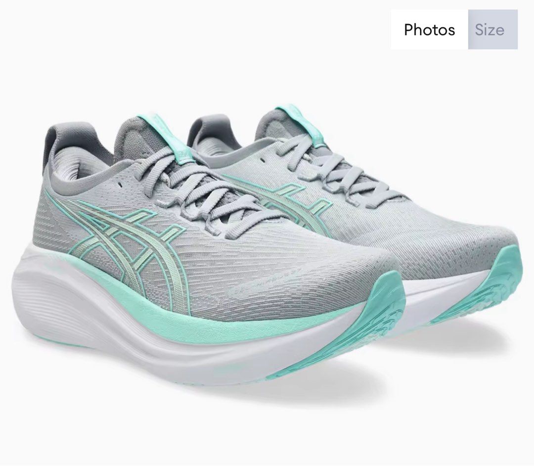 ASICS Women GEL-NIMBUS 27 WIDE Running Shoes in Piedmont Grey/Illuminate Mint (Category: Sneakers) located in Singapore. Submitted by silver15 (Listing ID 1421752106, Image 2). Description: - Brand new Asics Gel-Nimbus 27 wide running shoes - Stylish grey and mint colorway - Designed for comfort and performance - Suitable for running and everyday wear - Comes with original packaging.