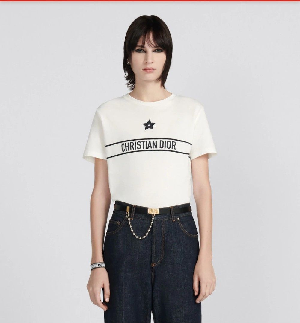 AUTHENTIC CHRISTIAN DIOR T SHIRT (Category: Luxury Apparel) located in Arayat. Submitted by angels_closet247 (Listing ID 1421699709, Image 1). Description: - Authentic Christian Dior T-shirt - Features a white base with a black star logo - Brand name across the chest - Made in Italy - Size: S Actual size using inches Armpit to Armpit 17 Lenght /23 fittings is Small Excellent Condition, Issue: 😉Message if you have any other question about sizing.