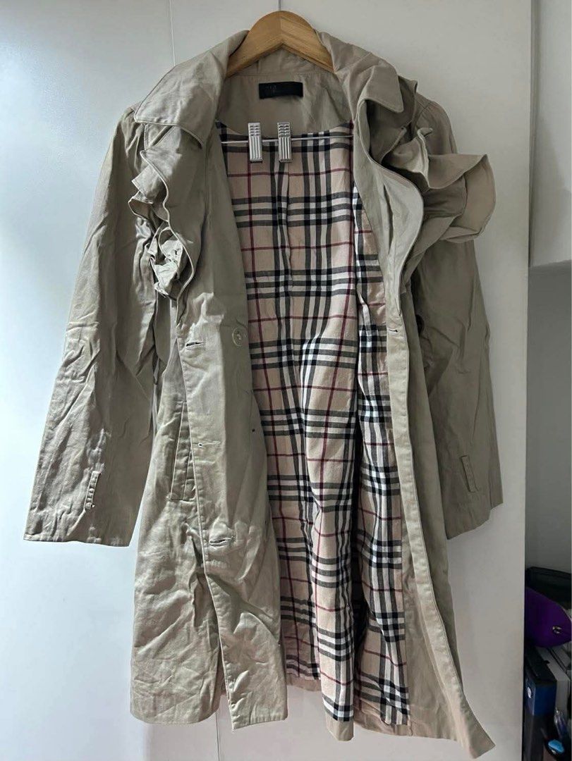 Beige Trench Coat (Category: Coats, Jackets and Outerwear) located in Quezon City. Submitted by r_decluttering (Listing ID 1421723584, Image 2). Description: Beige Trench Coat Thrifted; In great condition Fits Large | W: 21, L: 24, Arm: 23.