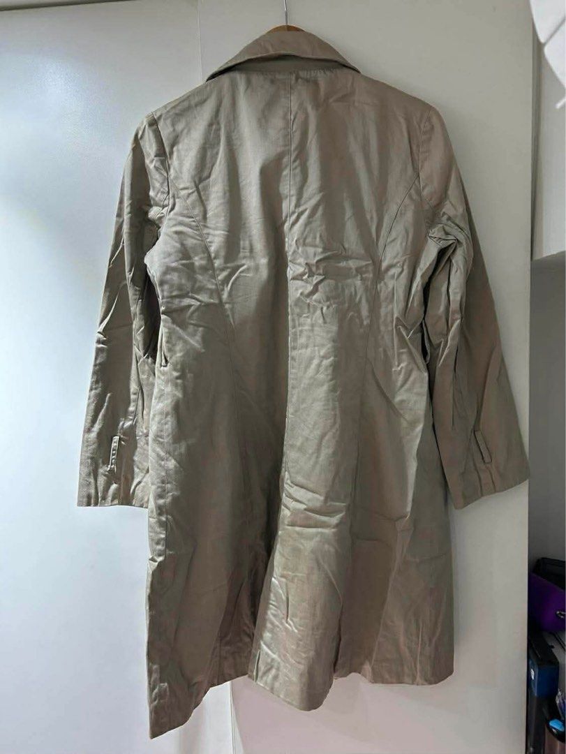 Beige Trench Coat (Category: Coats, Jackets and Outerwear) located in Quezon City. Submitted by r_decluttering (Listing ID 1421723584, Image 3). Description: Beige Trench Coat Thrifted; In great condition Fits Large | W: 21, L: 24, Arm: 23.