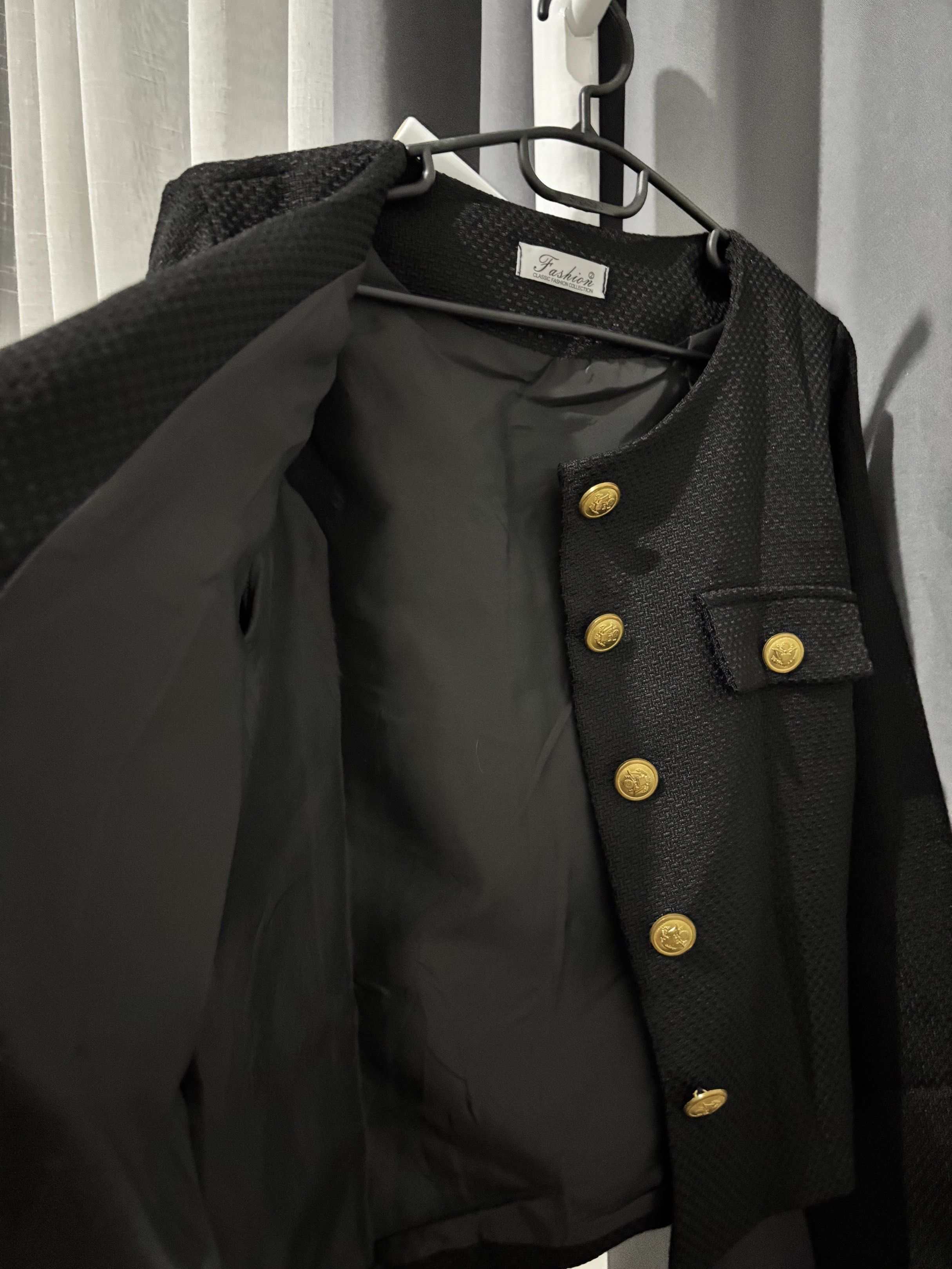 Black Blazer with Gold Buttons (Category: Coats, Jackets and Outerwear) located in Cavite. Submitted by clawsetangelaco (Listing ID 1421773775, Image 3). Description: - Black blazer with gold button details - Round neckline - Tailored fit - Two front pockets - Textured fabric - Lined interior - Gold buttons on sleeves.