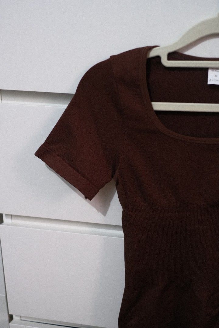Brown Short Sleeve T-shirt (Category: Blouses) located in Taguig. Submitted by fit.check.collective (Listing ID 1421787470, Image 2). Description: Brandnew, never usedNabili ko sa Tiktok, ang sikip sakin. .