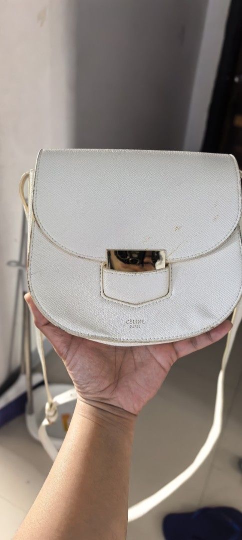 Celine small sling (Category: Luxury Bags & Wallets) located in Cagayan de Oro. Submitted by tommygurl1218 (Listing ID 1421790756, Image 1). Description: - Celine sling /crossbody bag Small size - Saddle bag shape - Flap closure - Gold-tone clasp - Made of textured leather - Celine logo detail - Long shoulder strap With sign of use.