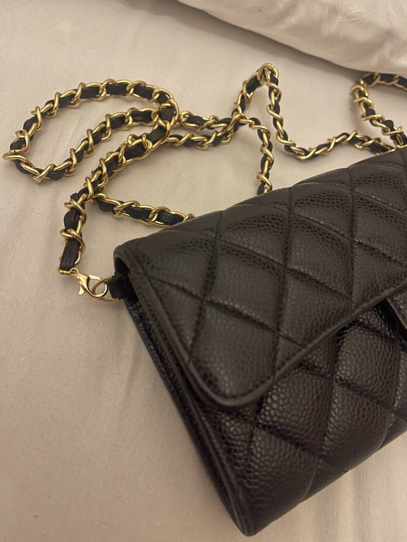 Chanel Classic Long Flap Wallet (Category: Luxury Bags & Wallets) located in Marilao. Submitted by wardrovearchives (Listing ID 1417419351, Image 2). Description: - Authentic Chanel Classic Long Flap Wallet /WOC - Black caviar leather - Iconic diamond quilting and CC turn-lock closure - Includes original box, dust bag, and authenticity card - Multiple card slots, compartments, and zippered coin pocket - Timeless and elegant design - In excellent 