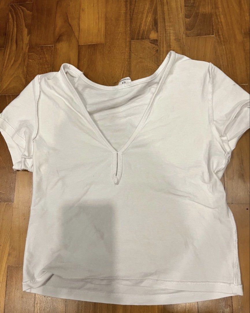 clothes clearance !! (Category: Blouses) located in Singapore. Submitted by ppepepe (Listing ID 1421789521, Image 4). Description: Each for $5 unless stated otherwise - pink nfl jersey (5$) black marker stain in the front as shown size is xs letting go as it doesn’t fit me anym - slide 3-5 are from cotton on ( 7$ for the tennis skort ) - slide 6 is frm uniqlo (5$) - slide 7 green cargo skirt ( 7$) super pretty can pair with black tops !! - slide 