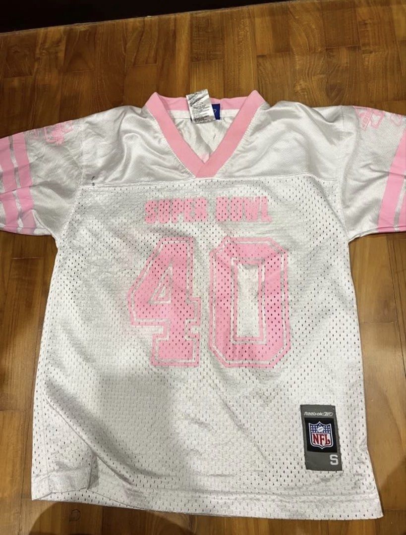 clothes clearance !! (Category: Blouses) located in Singapore. Submitted by ppepepe (Listing ID 1421789521, Image 1). Description: Each for $5 unless stated otherwise - pink nfl jersey (5$) black marker stain in the front as shown size is xs letting go as it doesn’t fit me anym - slide 3-5 are from cotton on ( 7$ for the tennis skort ) - slide 6 is frm uniqlo (5$) - slide 7 green cargo skirt ( 7$) super pretty can pair with black tops !! - slide 