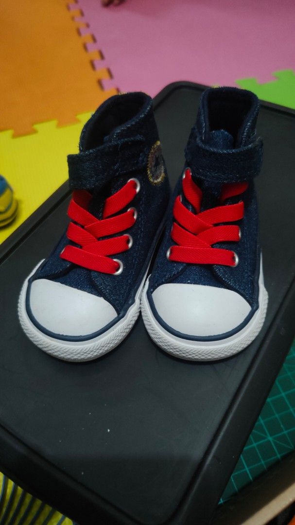 Converse Baby High-Top Sneakers (Category: Babies & Kids Fashion) located in Manila. Submitted by _sinigurl (Listing ID 1421673618, Image 1). Description: - Adorable baby Converse high-top sneakers - Denim-like blue upper - Red laces - White toe cap - Velcro strap for easy on and off - Converse logo on the side - Brown sole with Converse logo - Perfect for your little o.