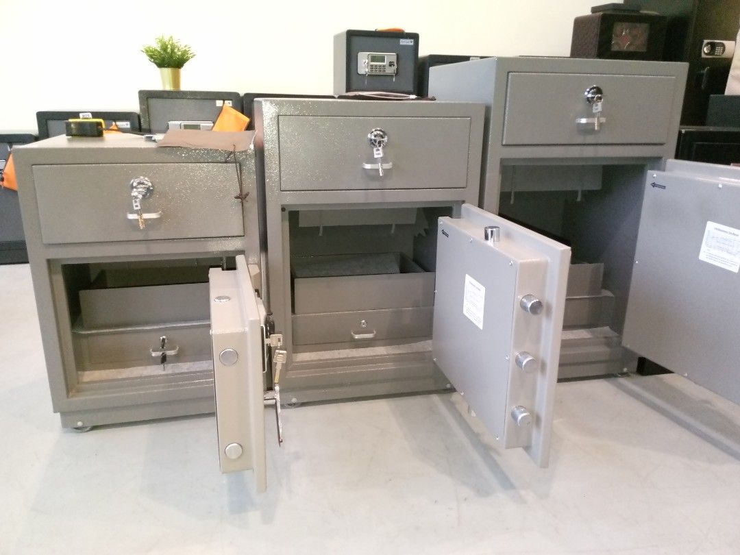 Digital Safe with dropbox (Category: Safe) located in Manila. Submitted by online_tindako (Listing ID 1421760457, Image 2). Description: - Secure digital safe with multiple drawers. - Features a digital keypad and key lock backup. - Neutral gray color, made of sturdy metal. - Korea Japan Industry tested and approved. smallest size price 23,750.00 external dimension: H67xW48xD45cm medium size price 25,000.00 external dimension: H77xW52xD48cm bigge