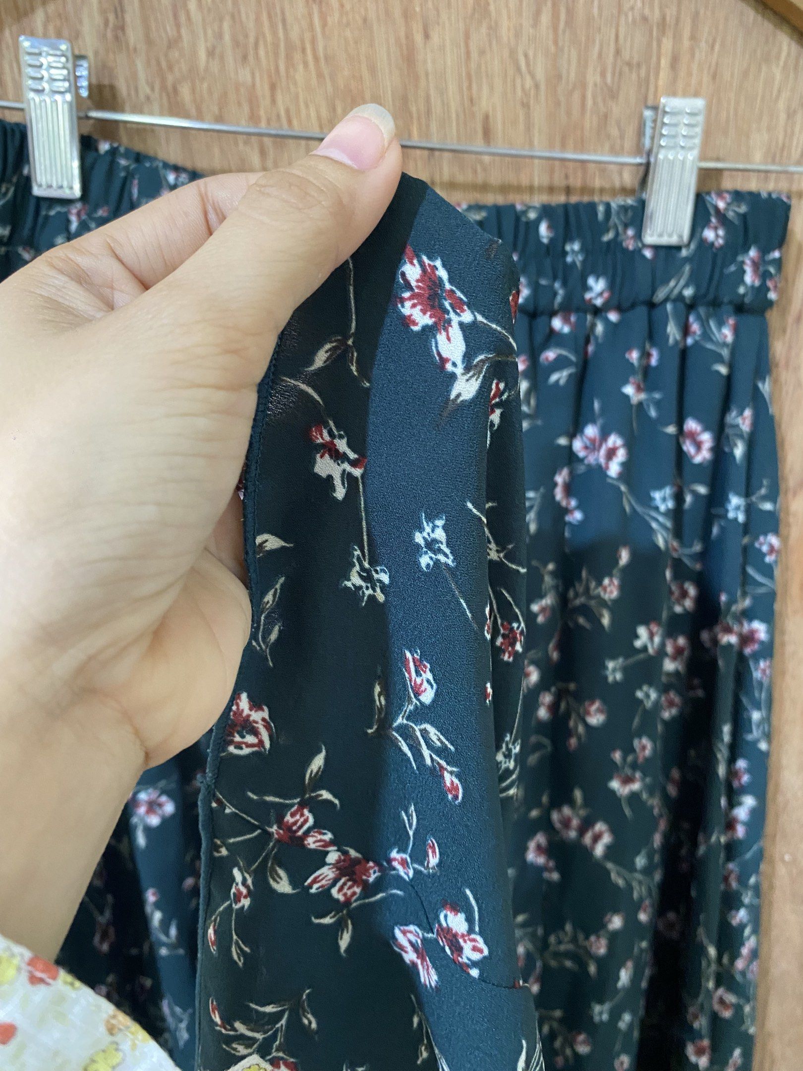 Floral Maxi Skirt (Category: Skirts) located in Guimba. Submitted by xeeeyaaaah (Listing ID 1421621751, Image 3). Description: - Dark green maxi skirt with floral pattern - Comfortable elastic waistband - Flowy, lightweight fabric - Ideal for warm weather - Versatile for various outfits.