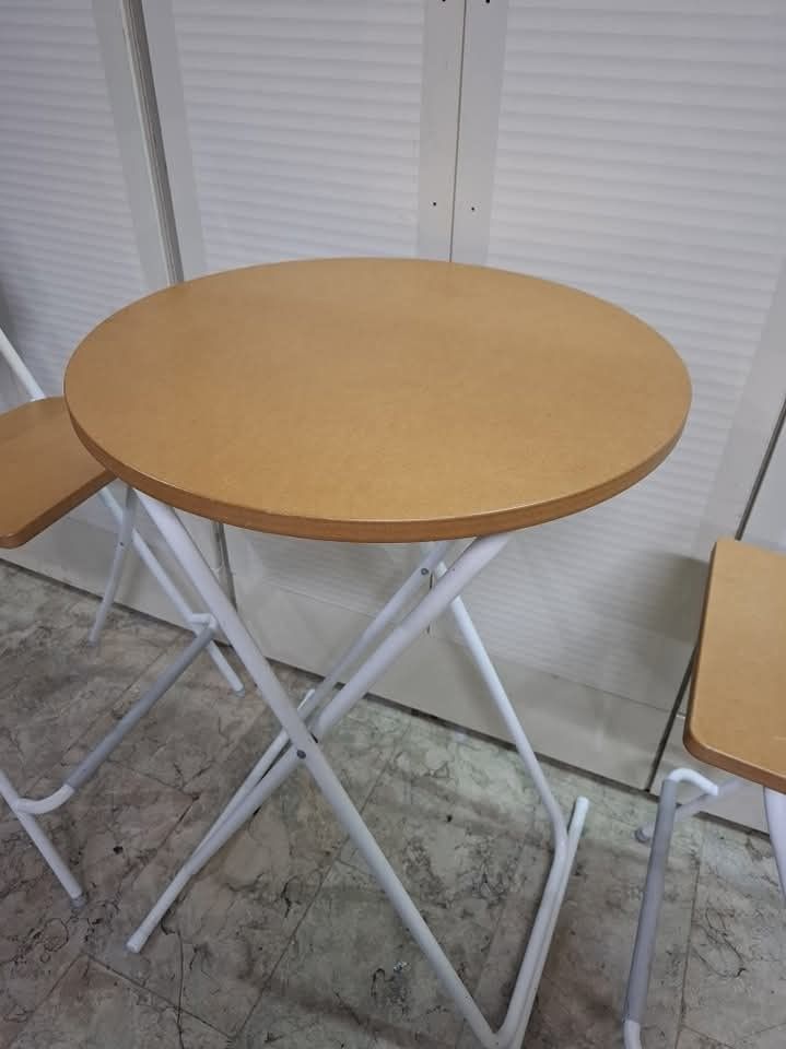 Folding Bar Table and Stool Chairs Set (Category: Chairs) located in Quezon City. Submitted by dannikkishoppe2 (Listing ID 1421669078, Image 2). Description: Folding Bar Table and Stool Chairs Set ₱7500‼️ These are SURPLUS items and not BRAND NEW. Please manage your expectations as there might be minimal flaws. Color may vary due to lighting, it may appear darker or lighter in person. Check photos first before buying. Please refrain from purchasi