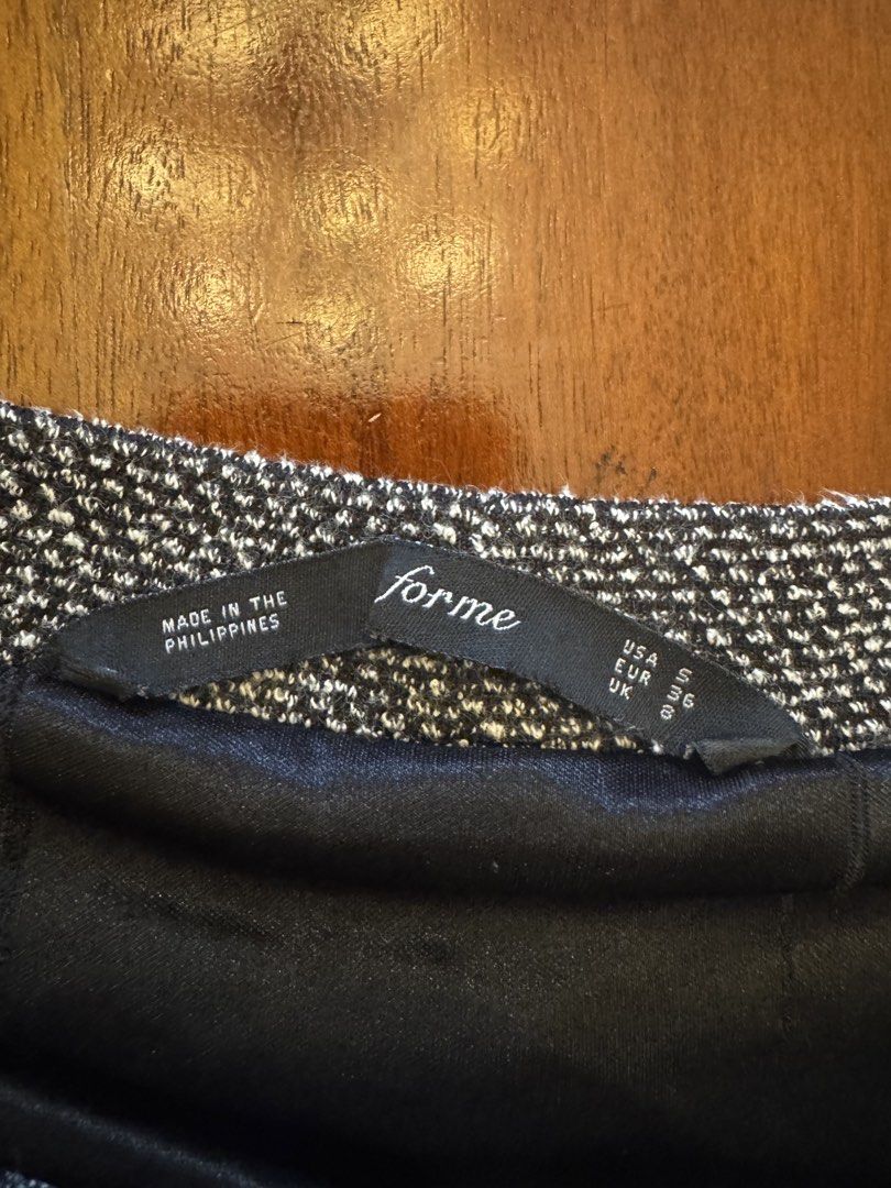 Forme Tweed Skirt (Category: Skirts) located in Mandaue City. Submitted by marginiz (Listing ID 1421679393, Image 3). Description: - Forme tweed skirt - Features a classic A-line silhouette - Size: US/UK 6 - Made in the Philippines - Black lining - Suitable for various occasions.