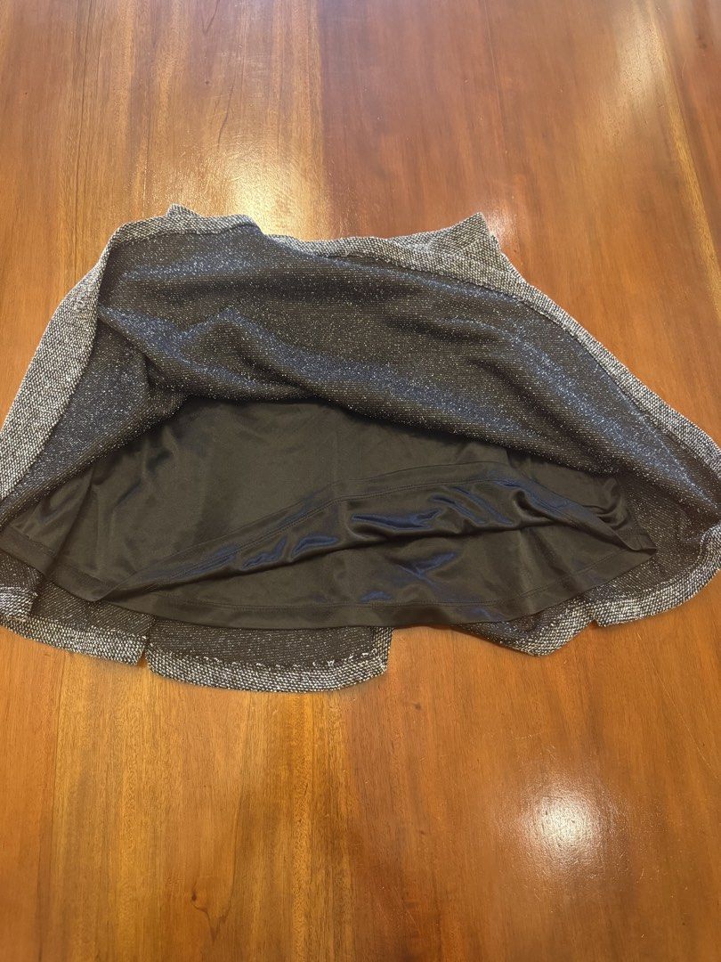 Forme Tweed Skirt (Category: Skirts) located in Mandaue City. Submitted by marginiz (Listing ID 1421679393, Image 2). Description: - Forme tweed skirt - Features a classic A-line silhouette - Size: US/UK 6 - Made in the Philippines - Black lining - Suitable for various occasions.