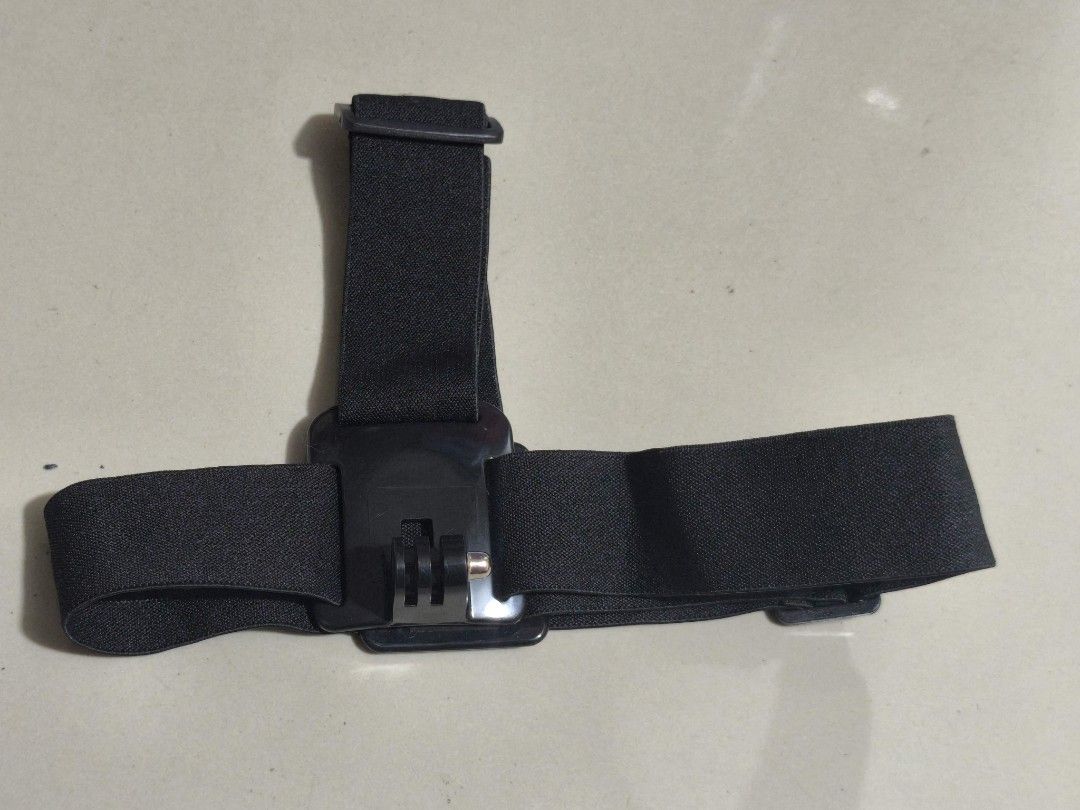 GoPro Head Strap Mount (Category: Other Photography Accessories) located in Taguig. Submitted by juliestjuly (Listing ID 1421719813, Image 3). Description: - GoPro head strap mount - Adjustable straps for a secure fit - Perfect for hands-free action recording - Made of durable black fabric - Features an easy-to-adjust buckle.
