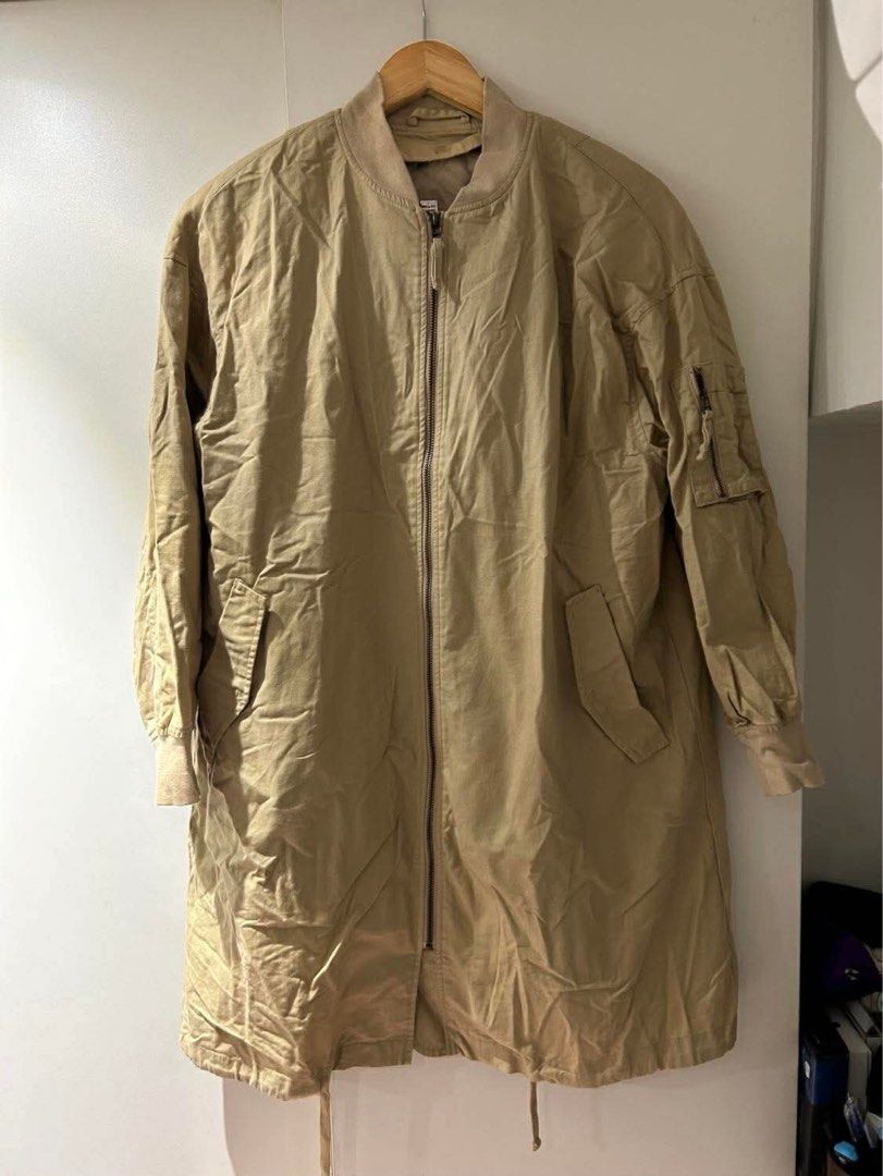 GU Padded Long Jacket (Category: Coats, Jackets and Outerwear) located in Quezon City. Submitted by r_decluttering (Listing ID 1421723385, Image 1). Description: GU Padded Long Jacket With puffer padding Large | W: 23, L: 35, Arm: 19.