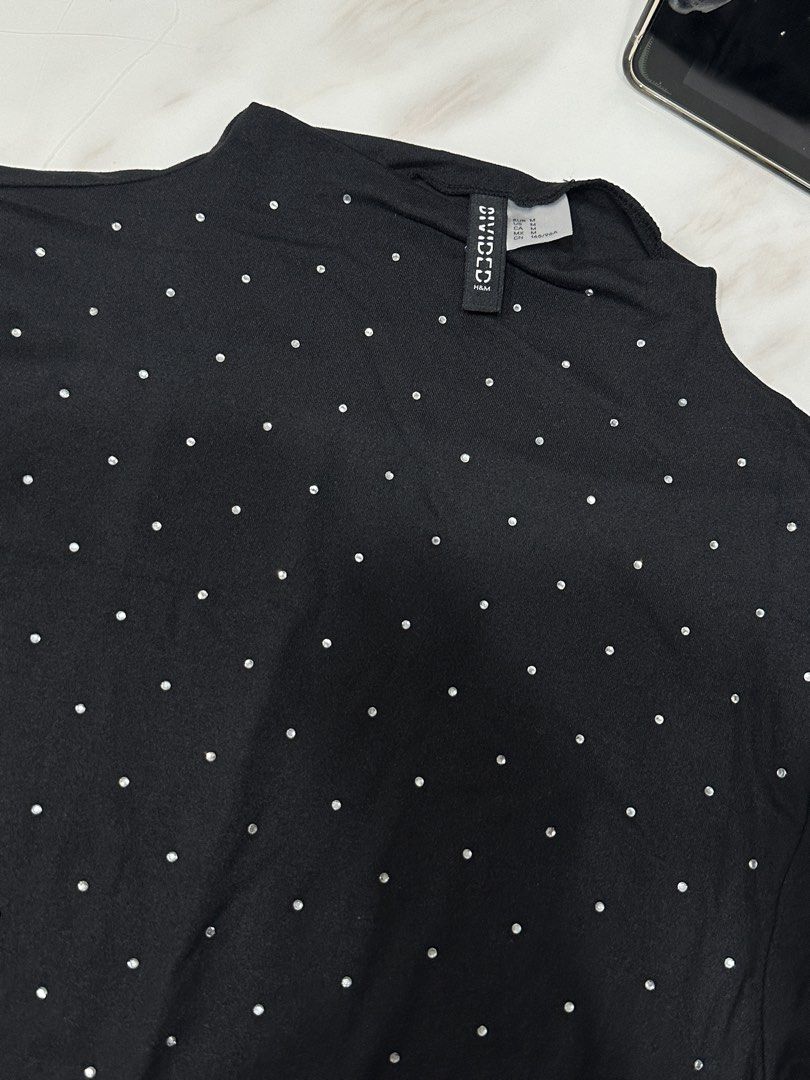 H&M Divided Black Studded Dress (Category: Dresses) located in Quezon City. Submitted by prelovednd21 (Listing ID 1421665972, Image 3). Description: - H&M Divided Black Studded Dress - Size: M - Condition: Good - Features: Studded design - Color: Black - Perfect for: Special occasions or a night out.