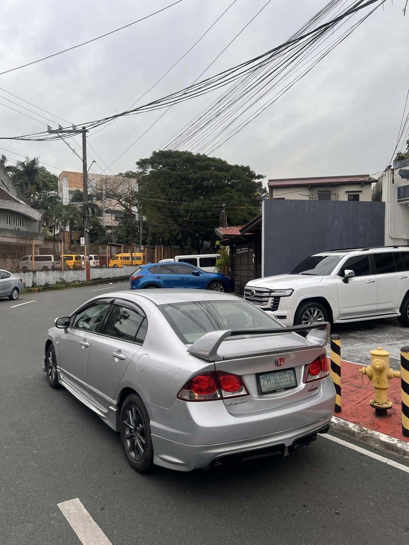 Honda Civic 1.8 VTI-S (A) (Category: Used Cars) located in Rizal. Submitted by grumfo (Listing ID 1421722435, Image 2). Description: HONDA CIVIC FD 1.8S MUGEN RR INSPIRED AUTOMATIC TRANNY HONDA CIVIC FD 1.8S 2008 ACQUIRED ORIG OR CR 2VALID ID 3SIGNS GAGAMITIN NALANG COLD AC NO TRANNY ISSUE NO ENGINE ISSUE (UPGRADES) MUGEN RR BODY KITS FC MAGS OCTAGON TAIL LIGHTS ORIG STANLEY 300K ANTIPOLO MASINAG LOC.