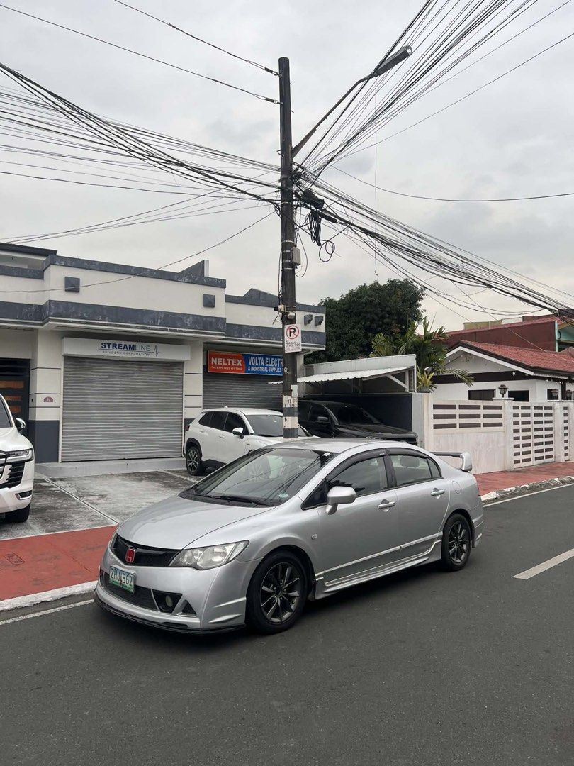 Honda Civic 1.8 VTI-S (A) (Category: Used Cars) located in Rizal. Submitted by grumfo (Listing ID 1421722435, Image 3). Description: HONDA CIVIC FD 1.8S MUGEN RR INSPIRED AUTOMATIC TRANNY HONDA CIVIC FD 1.8S 2008 ACQUIRED ORIG OR CR 2VALID ID 3SIGNS GAGAMITIN NALANG COLD AC NO TRANNY ISSUE NO ENGINE ISSUE (UPGRADES) MUGEN RR BODY KITS FC MAGS OCTAGON TAIL LIGHTS ORIG STANLEY 300K ANTIPOLO MASINAG LOC.