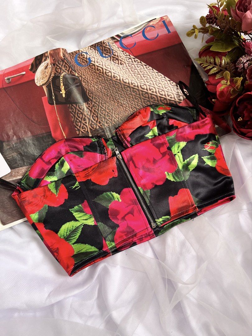I Saw It First Floral Corset Top (Category: Others Tops) located in Las Pinas. Submitted by nakedstudio (Listing ID 1421623936, Image 3). Description: - Floral corset top - Red roses on black background - Sweetheart neckline - Lace detailing - Front zipper closure - Size: UK 8, US 4, EUR 36 - Adds elegance to any outfit.
