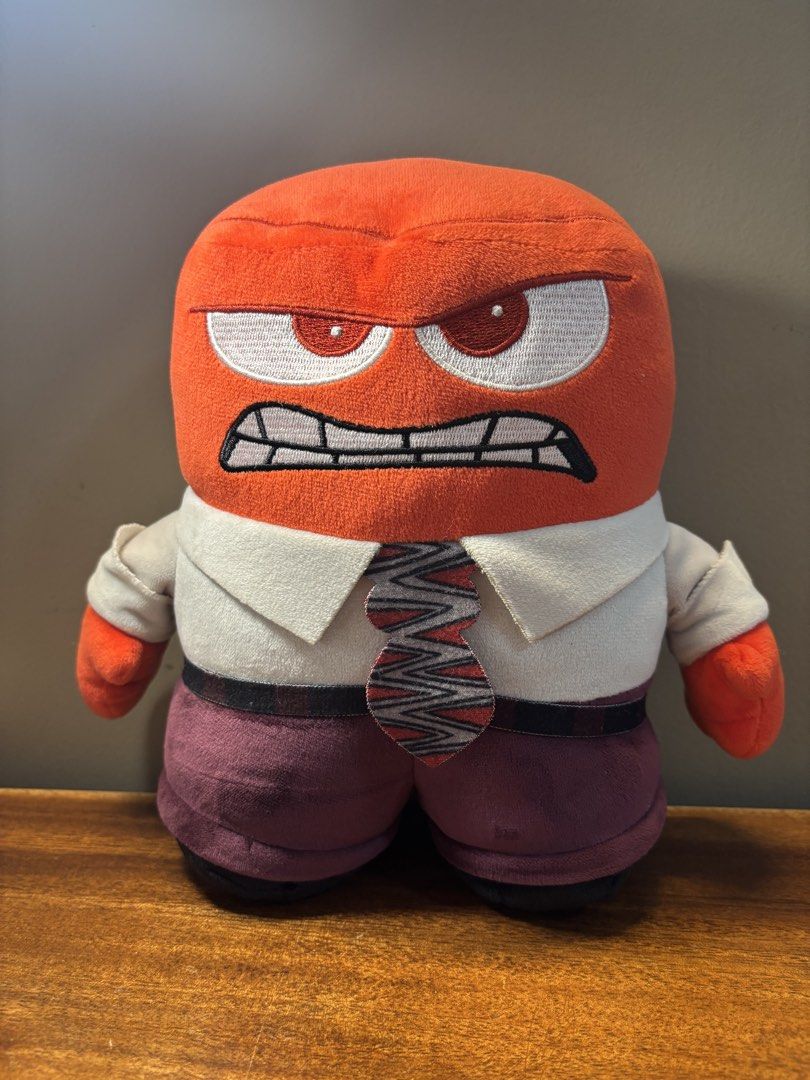 Inside Out Anger Plush Toy - medium size (Category: Plushies & Soft Toys) located in Calamba. Submitted by cur8d (Listing ID 1421713941, Image 1). Description: - Inside Out Anger plush toy - Features Anger's iconic look: red head, white shirt, purple pants, and tie - Made of soft material - Well-made and durable - Perfect collectible for Inside Out fans.