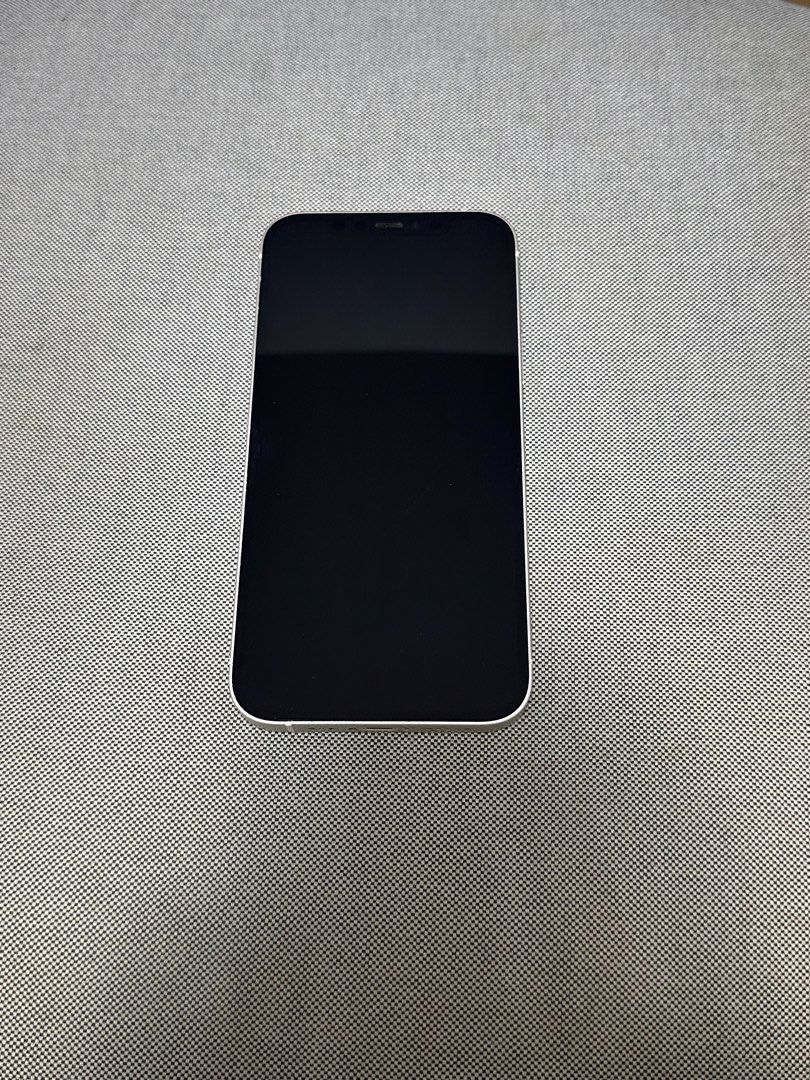Iphone 12 (White, 64GB) (Category: iPhone 12 Series) located in Taguig. Submitted by klshop_ (Listing ID 1421704473, Image 2). Description: Fully functional Battery health: 84% White 64GB.