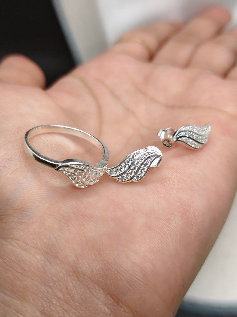 Italy silver wing-shaped Ring and Earrings Set (Category: Earrings) located in San Mateo. Submitted by joryee (Listing ID 1421659466, Image 2). Description: -Italy Silver finish ring and earrings set -With 925 markings -Jewelry box , 720 ***Ring size, 7.