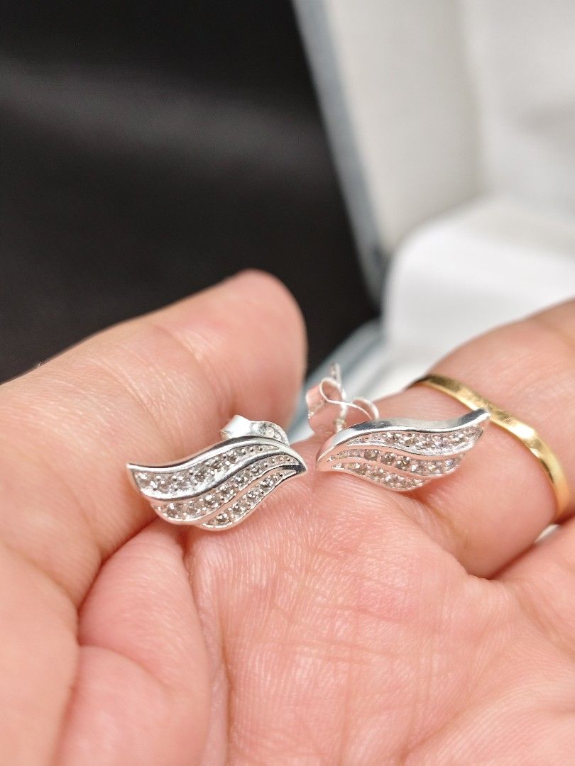 Italy silver wing-shaped Ring and Earrings Set (Category: Earrings) located in San Mateo. Submitted by joryee (Listing ID 1421659466, Image 3). Description: -Italy Silver finish ring and earrings set -With 925 markings -Jewelry box , 720 ***Ring size, 7.