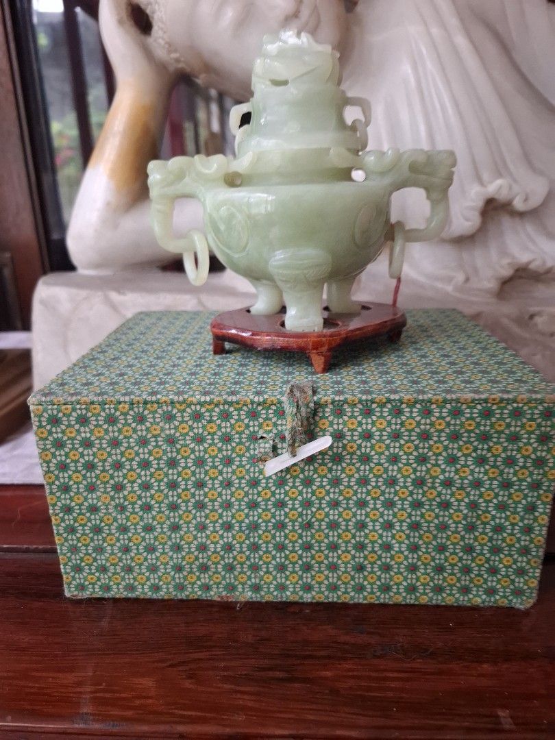 Jade Incense Burner with stand and original Box (Category: Vintage Collectibles) located in Quezon City. Submitted by cncarousel (Listing ID 1421693547, Image 3). Description: - Jade incense burner - Intricate dragon detailing - Includes wooden stand - Comes with a decorative box - Box features patterned design and clasp closure - Light green jade - Features a lid and three legs.