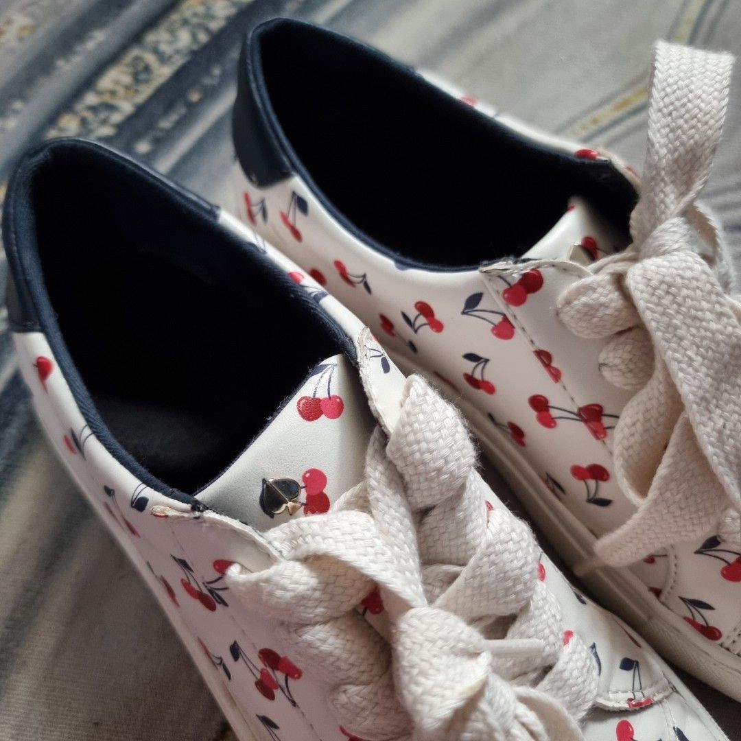 Kate Spade Cherry Print Sneakers (Category: Sneakers) located in Makati City. Submitted by PeppermintPanda (Listing ID 1421681964, Image 2). Description: 💯 Original Kate Spade ❗️ ✅️ BNWOB super nice in actual 🍒 White sneakers with a cherry print. ☁️ Super soft insole (Memory Cloud foam) 💸 MOP: GCash/Bank Transfer 🔥 Same day shipping once paid.