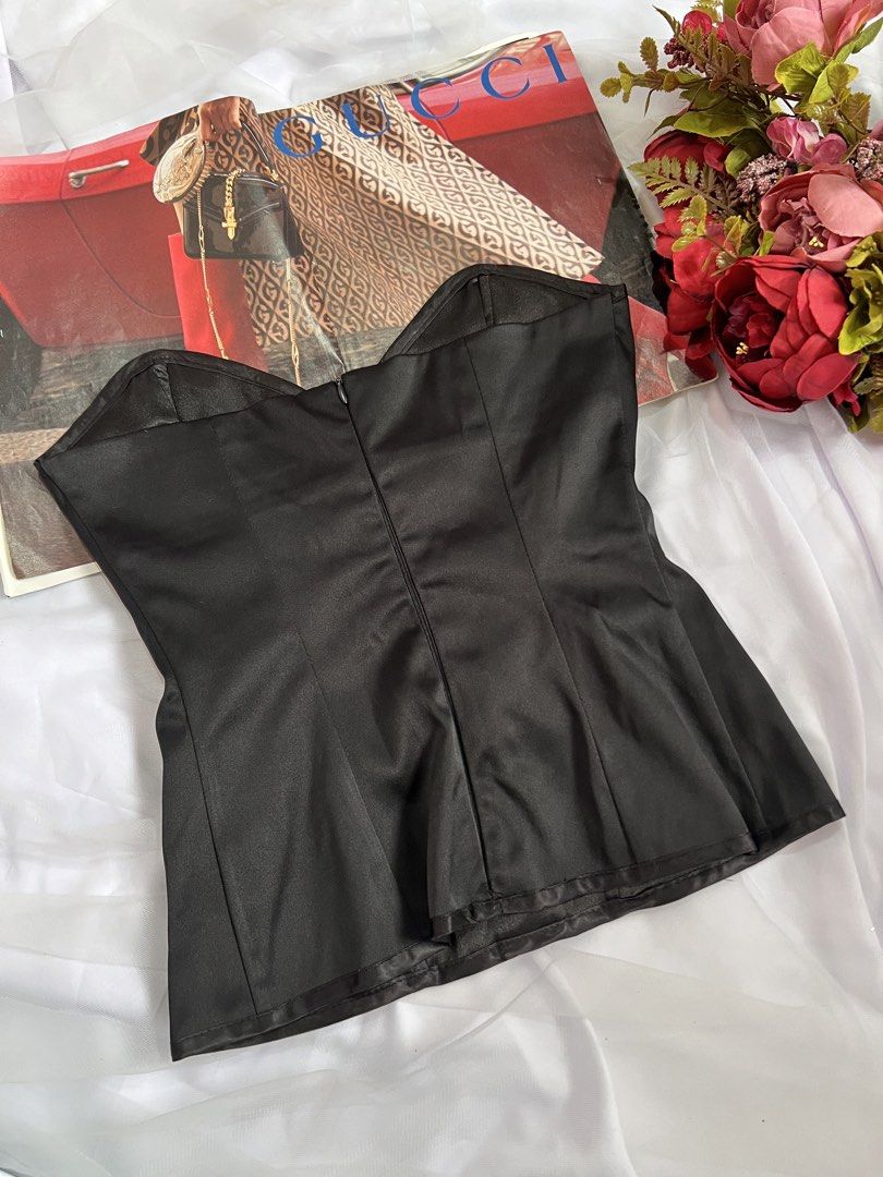 Kitten D'Amour Red and Black Corset (Category: Others Tops) located in Las Pinas. Submitted by nakedstudio (Listing ID 1421758480, Image 3). Description: - Kitten D'Amour corset - Red and black color - Strapless design - Satin finish with lace detailing - Features buttons and zipper closure - Size 8 (Fits S 32-34) - Made in Australia - Ideal for special events or vintage looks.
