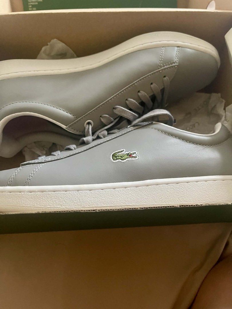 Lacoste Hydez 119 1P BMA Sneakers (Category: Sneakers) located in Makati City. Submitted by xaannee (Listing ID 1421660344, Image 3). Description: - Brand new Lacoste sneakers - Color: Grey - Size: 9.5 US / 42.5 EUR / 9.5 UK - Includes original box - White sole - Red insole - Lacoste logo visible - New with tags - Made in Vietnam Pick up at makati.
