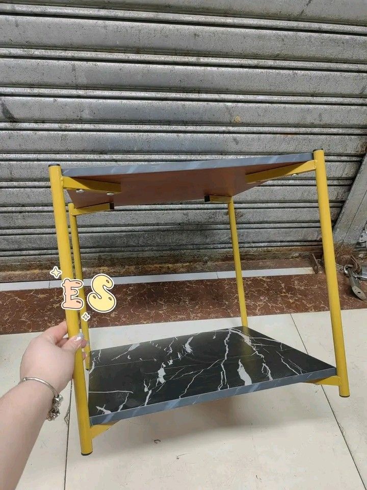 Marble Top Side Table with Gold Frame (Category: Tables & Sets) located in Makati City. Submitted by oideme (Listing ID 1421643614, Image 3). Description: - Stylish side table - Marble-look top - Gold-colored metal frame - Second shelf for storage - Available in black and white marble designs - Square-shaped - Ideal for living rooms and bedrooms.