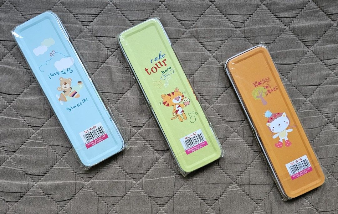 Metal (tin) pencil case (Category: Stationery & School Supplies) located in Quezon City. Submitted by the_l1ttlej0ys (Listing ID 1421763736, Image 2). Description: brand new metal pencil cases Php10 each 3 designs to choose from: - bear in plane with balloons: 1 pc available -cat and bird with trees: 4 pcs available -tiger and monkey with cupcake: 5 pcs available.