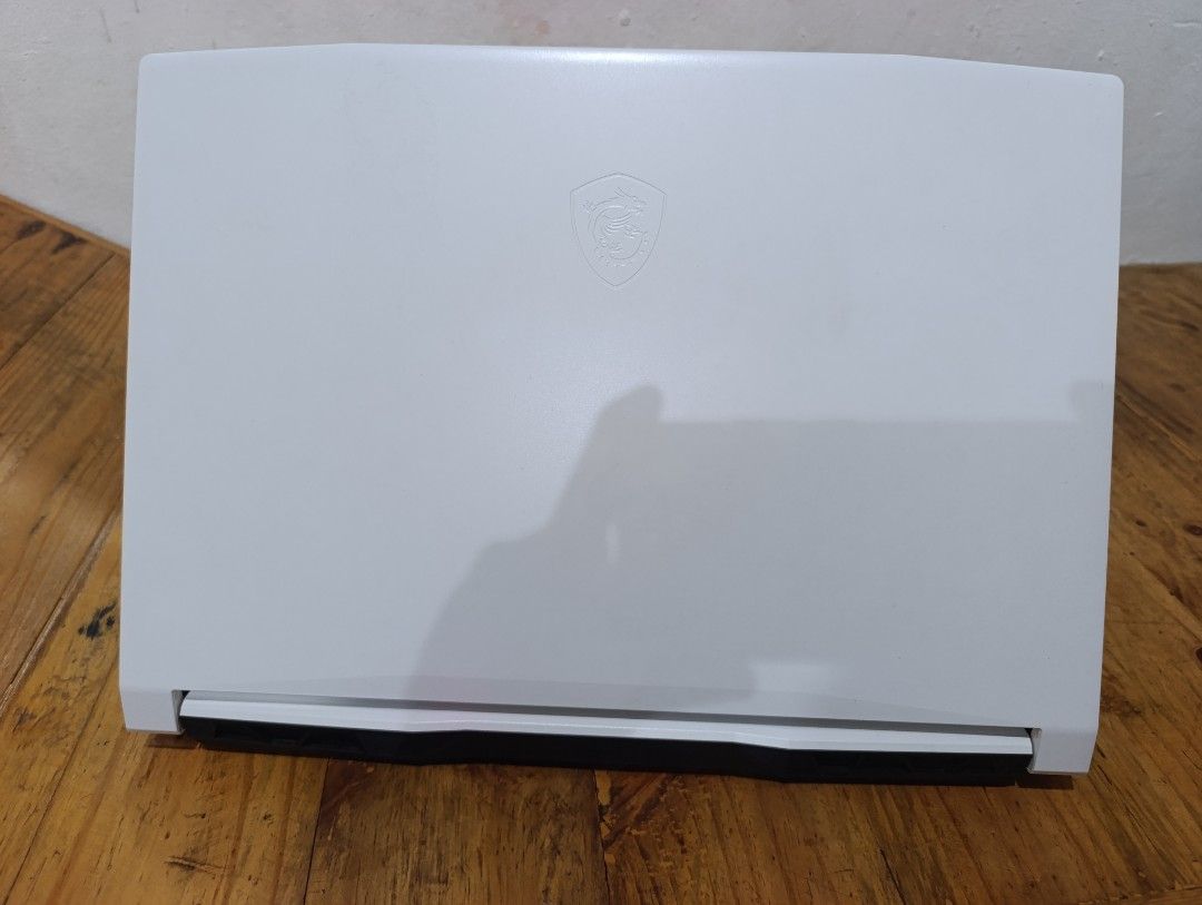 MSI Sword 15 A11UD Gaming Laptop (Category: Laptops & Notebooks) located in Quezon City. Submitted by yourstruly2018 (Listing ID 1421705301, Image 2). Description: The MSI Sword 15 A11UD-270XKR is a 15.6-inch, white-colored gaming laptop featuring an 11th Gen Intel Core i7-11800H processor, NVIDIA GeForce RTX 3050 Ti (4GB GDDR6) GPU, and a 144Hz FHD (1920x1080) IPS-level display. It commonly features 16GB DDR4 RAM, a 512GB NVMe SSD, and supports 