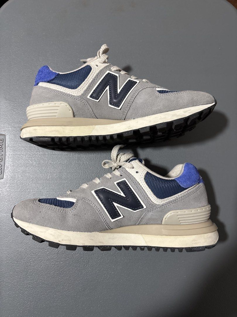 New Balance 574 Grey Navy Sneakers (Category: Sneakers) located in Makati City. Submitted by vanbustling (Listing ID 1421714744, Image 3). Description: - New Balance 574 Legacy sneakers - Color: Grey and Navy - Unisex - Size: 7 US Men's / 8.5 US Women's - Features: - Suede and mesh upper - Lace-up closure - Cushioned midsole - Durable rubber outsole - Made in Indonesia Slightly used No box RFS decluttering Shipping shouldered by buyer .