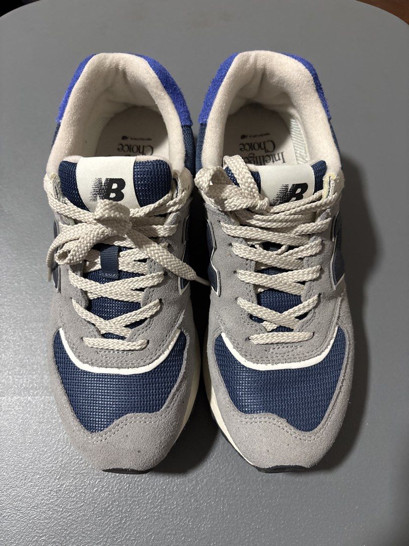 New Balance 574 Grey Navy Sneakers (Category: Sneakers) located in Makati City. Submitted by vanbustling (Listing ID 1421714744, Image 2). Description: - New Balance 574 Legacy sneakers - Color: Grey and Navy - Unisex - Size: 7 US Men's / 8.5 US Women's - Features: - Suede and mesh upper - Lace-up closure - Cushioned midsole - Durable rubber outsole - Made in Indonesia Slightly used No box RFS decluttering Shipping shouldered by buyer .