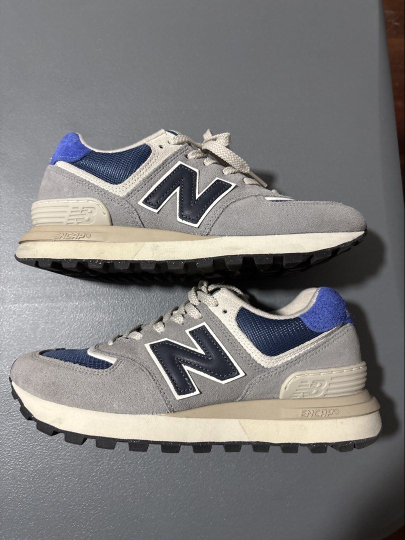 New Balance 574 Grey Navy Sneakers (Category: Sneakers) located in Makati City. Submitted by vanbustling (Listing ID 1421714744, Image 1). Description: - New Balance 574 Legacy sneakers - Color: Grey and Navy - Unisex - Size: 7 US Men's / 8.5 US Women's - Features: - Suede and mesh upper - Lace-up closure - Cushioned midsole - Durable rubber outsole - Made in Indonesia Slightly used No box RFS decluttering Shipping shouldered by buyer .