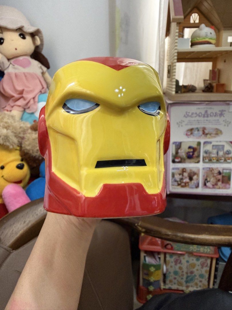 (New) Disney Store Marvel Iron Man Mug (Category: Coffee & Tea Tableware) located in Mandaue City. Submitted by erin_grace (Listing ID 1421631760, Image 1). Description: - Iron Man mug from Disney Store. - Features the iconic Iron Man helmet design in red and yellow. - Comfortable handle. - Perfect for your favorite beverages. - Includes Disney Store and Marvel logos..