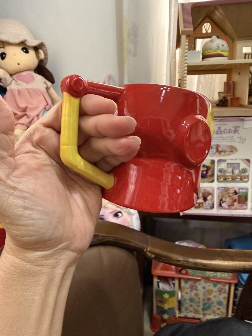 (New) Disney Store Marvel Iron Man Mug (Category: Coffee & Tea Tableware) located in Mandaue City. Submitted by erin_grace (Listing ID 1421631760, Image 3). Description: - Iron Man mug from Disney Store. - Features the iconic Iron Man helmet design in red and yellow. - Comfortable handle. - Perfect for your favorite beverages. - Includes Disney Store and Marvel logos..