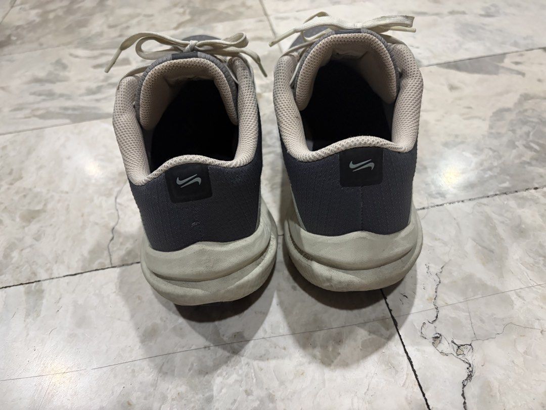 Nike Air Winflo 10 - Low price (Category: Sneakers) located in Paranaque City. Submitted by natchin30 (Listing ID 1421772697, Image 2). Description: - Nike Air Winflo 10 running shoes - Flat Pewter colorway - White Nike swoosh - Lace-up closure - Size: US 9 - Cushioned sole for comfort - Breathable upper.