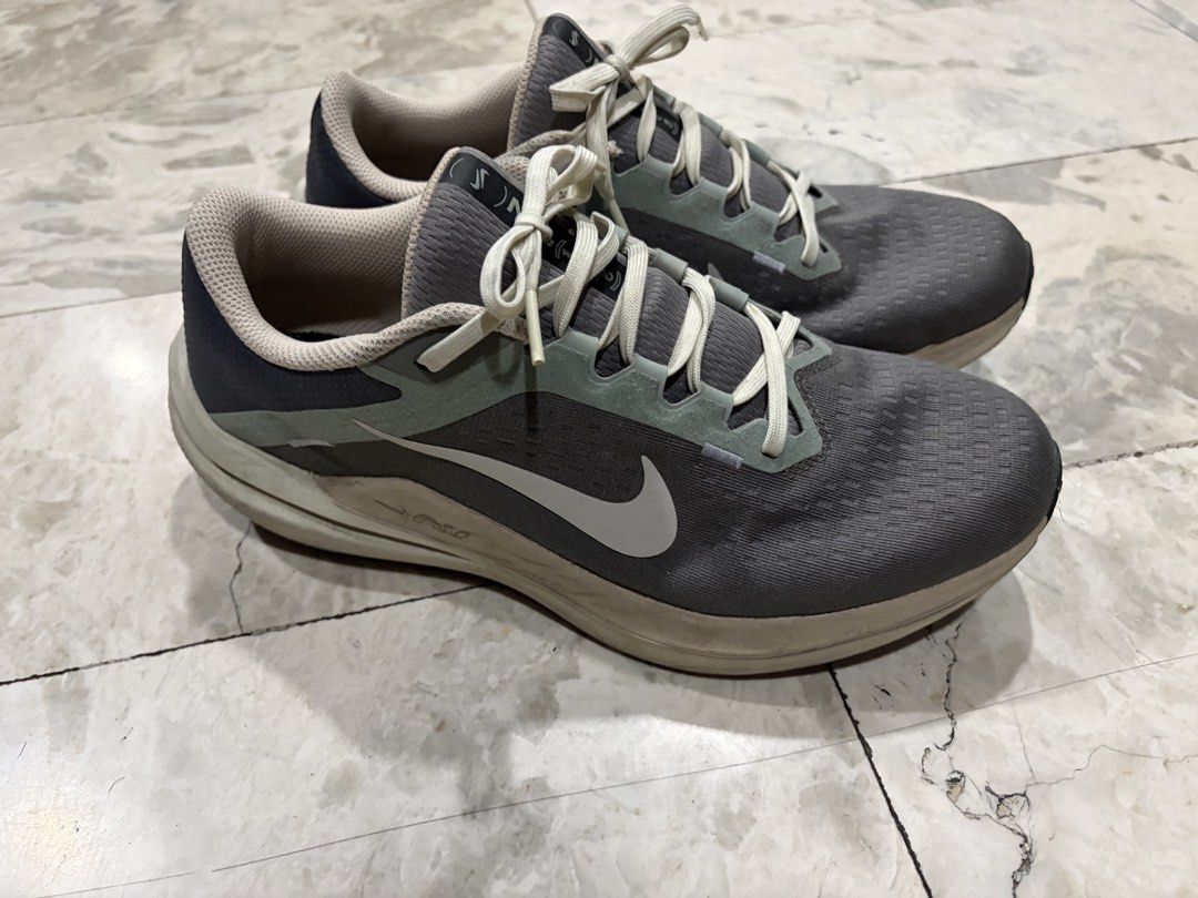Nike Air Winflo 10 - Low price (Category: Sneakers) located in Paranaque City. Submitted by natchin30 (Listing ID 1421772697, Image 3). Description: - Nike Air Winflo 10 running shoes - Flat Pewter colorway - White Nike swoosh - Lace-up closure - Size: US 9 - Cushioned sole for comfort - Breathable upper.