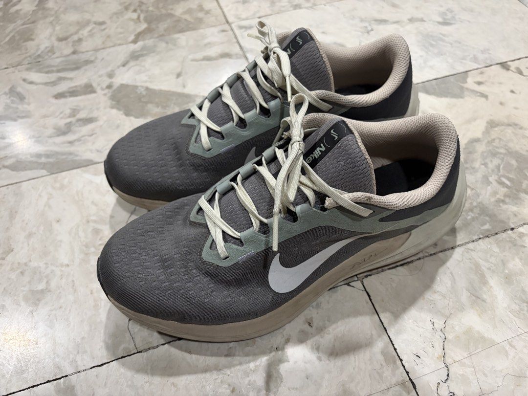 Nike Air Winflo 10 - Low price (Category: Sneakers) located in Paranaque City. Submitted by natchin30 (Listing ID 1421772697, Image 1). Description: - Nike Air Winflo 10 running shoes - Flat Pewter colorway - White Nike swoosh - Lace-up closure - Size: US 9 - Cushioned sole for comfort - Breathable upper.