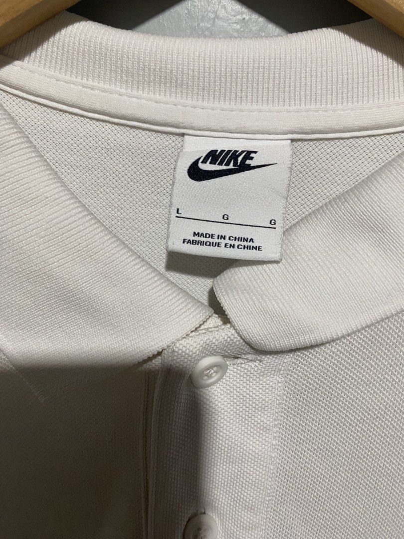 Nike Polo Shirt - White - Size L (Category: Tshirts & Polo Shirts ) located in Davao. Submitted by johnpauwu (Listing ID 1421754828, Image 3). Description: - Nike polo shirt - Size: Large - Features embroidered Nike logo - Classic polo collar and button-up placket - Made in China - Style code: CJ4457-100 22x29.5 back length 30.5 minimal scratch.