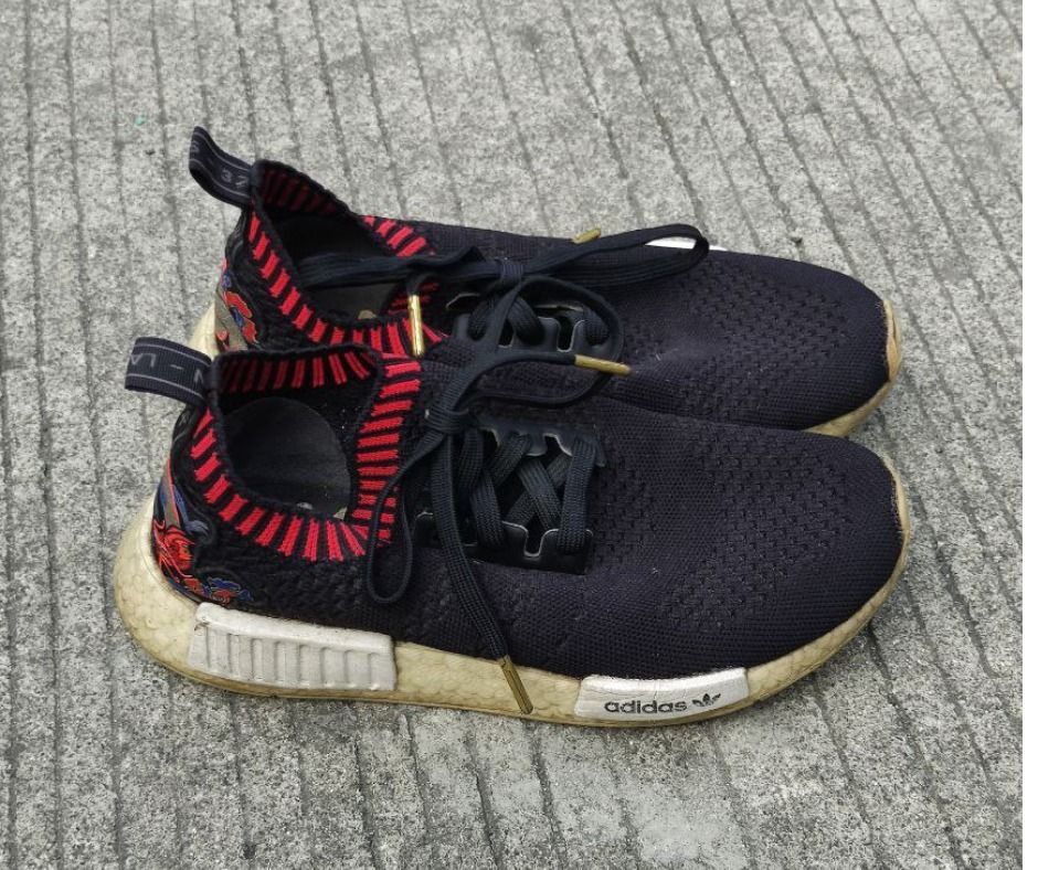 NMD R1 Dragon Boat (Category: Casual Shoes) located in Las Pinas. Submitted by jae.eaj (Listing ID 1421726973, Image 2). Description: NMD R1 Dragon Boat - Still in great shape - All designs in tact Issues: - Yellowing of boost - Needs cleaning Size: 6.5 mens (can fit 7 mens).