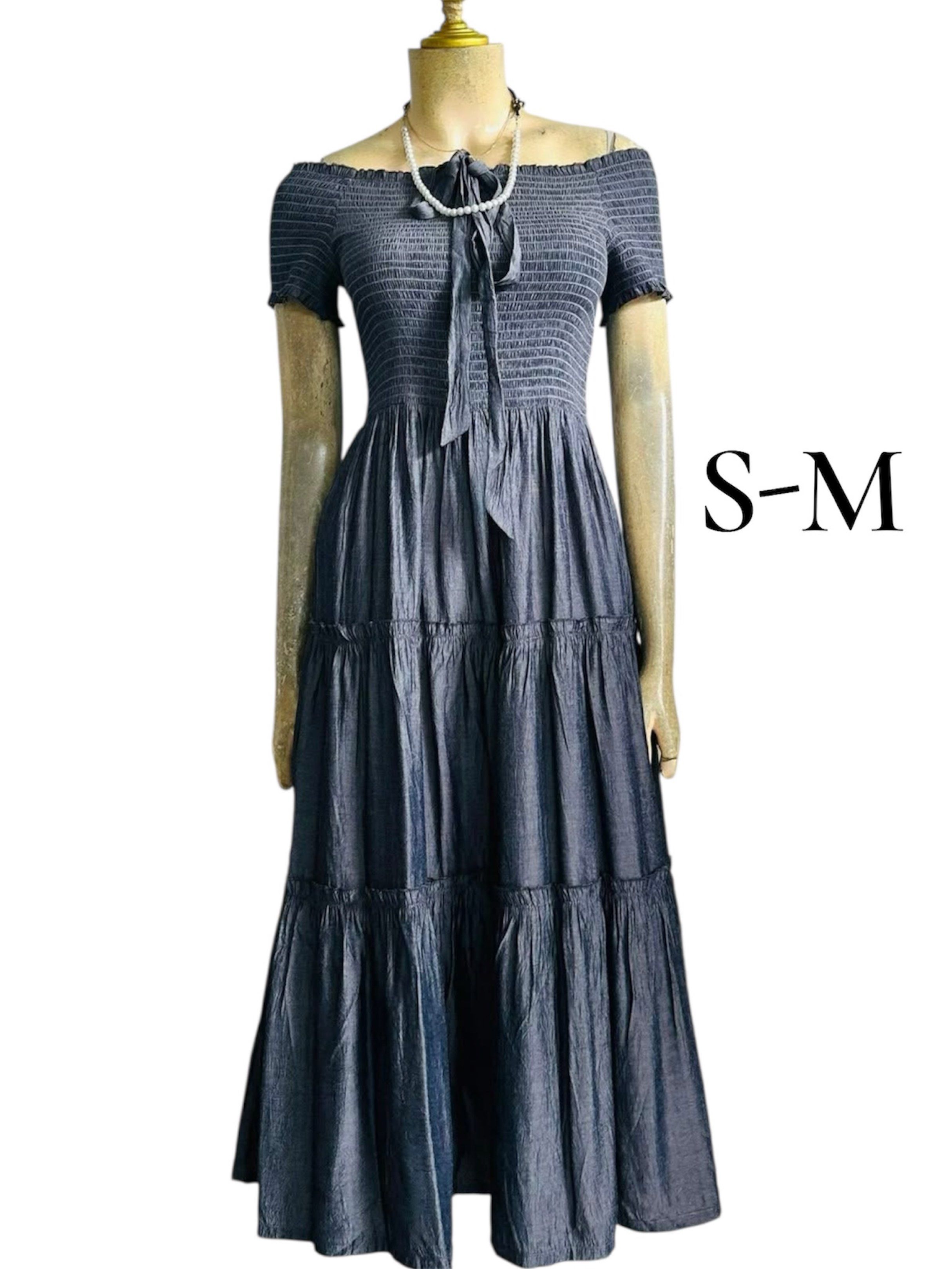 Off-Shoulder Tiered Maxi Dress S-M (Category: Dresses) located in Daraga. Submitted by rrcollection34 (Listing ID 1421623797, Image 1). Description: - Off-shoulder maxi dress - Smocked bodice - Tiered skirt - Fits sizes S-M - Short sleeves - Flowy silhouette - Perfect for casual outings.