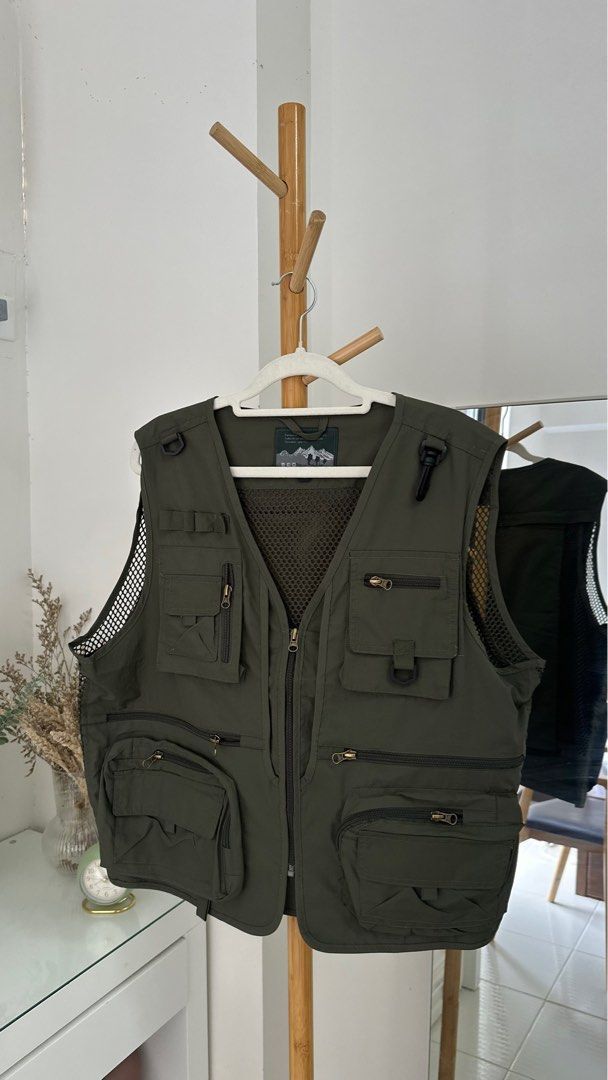 Olive Green Multi-Pocket Vest (Category: Vests) located in Santa Rosa. Submitted by declutterbydl (Listing ID 1421677559, Image 1). Description: i ordered it from tiktok. its too big for me. see the photos. no issue at all. i haven't worn it. - Olive green vest - Multiple pockets - Zipper closure - Mesh lining for breathability - Collar design - Hanging loop - Ideal for outdoor use.