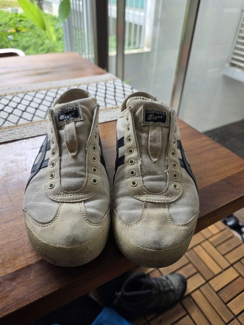 Authentic Onitsuka Tiger Mexico (Category: Sneakers) located in Singapore. Submitted by k.anvr (Listing ID 1421680692, Image 1). Description: - Onitsuka Tiger Mexico 66 sneakers - Color: Cream and Navy - Size: US 10 / 28cm Lightly Worn. RFS: changing to proper shoes. Self collect from my unit or arrange for your own courier.