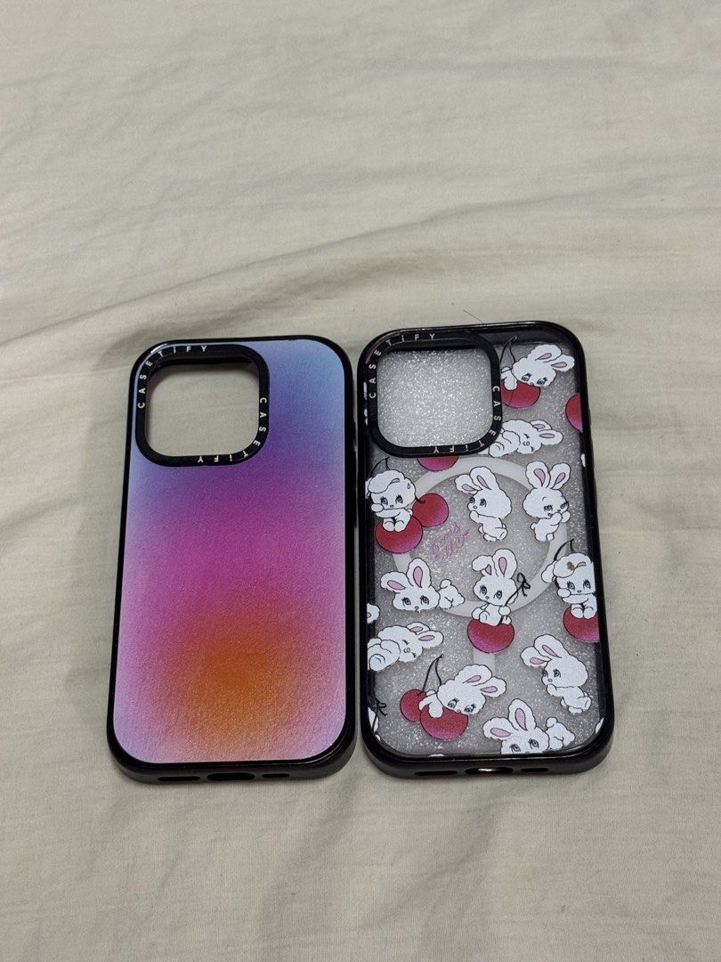 ORIGINAL CASETIFY IPHONE 15 PRO CASES (Category: Cases & Sleeves) located in Manila. Submitted by yenazdeclutter (Listing ID 1421632121, Image 1). Description: ‼️ PLEASE READ BEFORE SENDING A MESSAGE ‼️ RFS: Decluttering Cherry Mix case: I absolutely loved this case! Used it for 4 months, bought it at around 2900 pesos using voucher Purple Aura: Already bought this secondhand so I'm selling this for 500 pesos only. Also a very good case 👍🏼 - P2